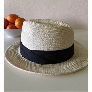 Straw hat with black trim